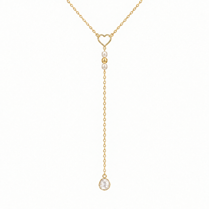 Arrière du collier avec petite perle centrale dorée martelée