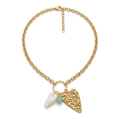 Collier avec le cœur allongé et texturé de ta nouvelle référence, retouche en cours