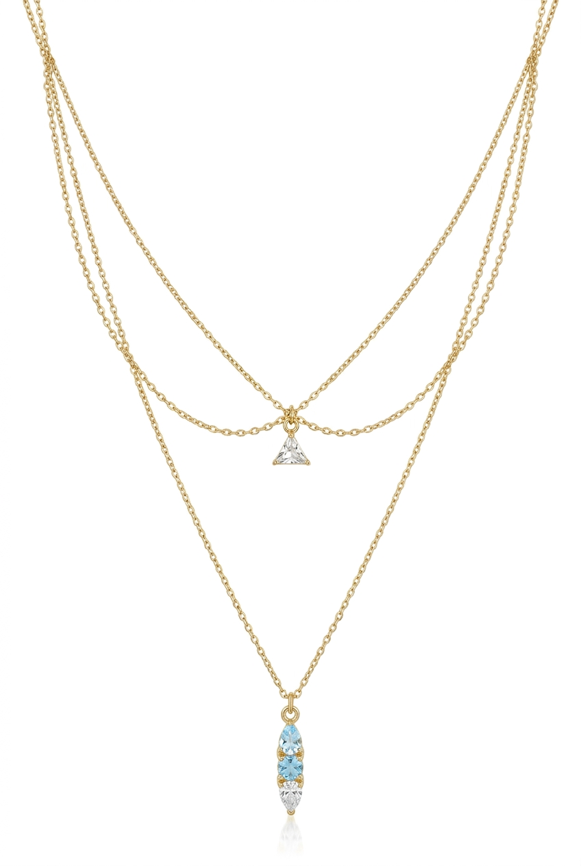 Retouche en cours : pendentif du bas avec deux pierres bleu ciel et la dernière blanche